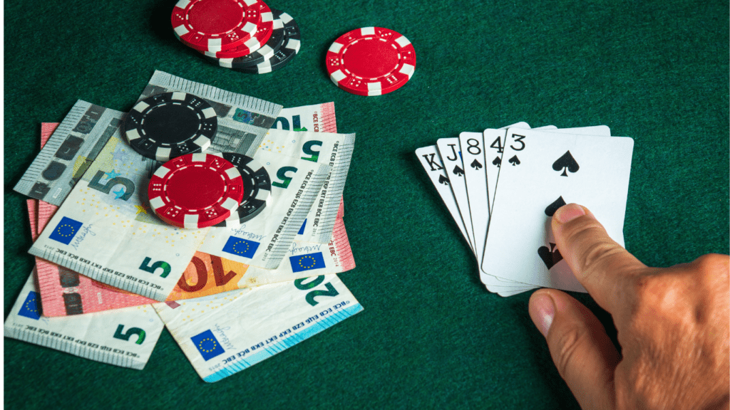 Playing Cards , money and casino chips