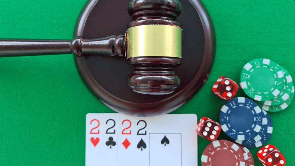 Gavel and playing cards and casino chips