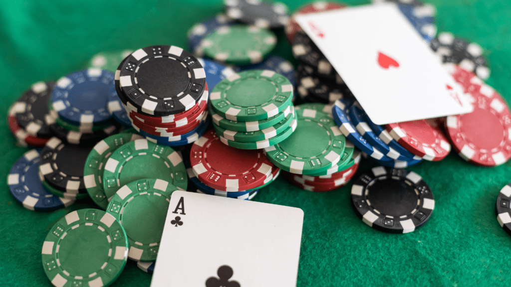 Playing Cards and pile of casino chips